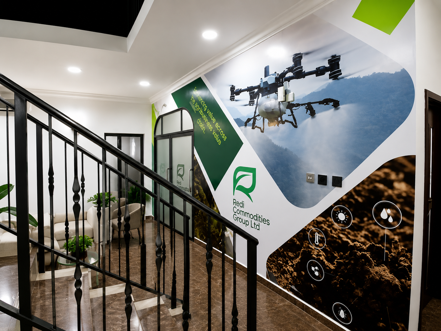 Office interior with a large-format printed brand mural by MYKA Signage