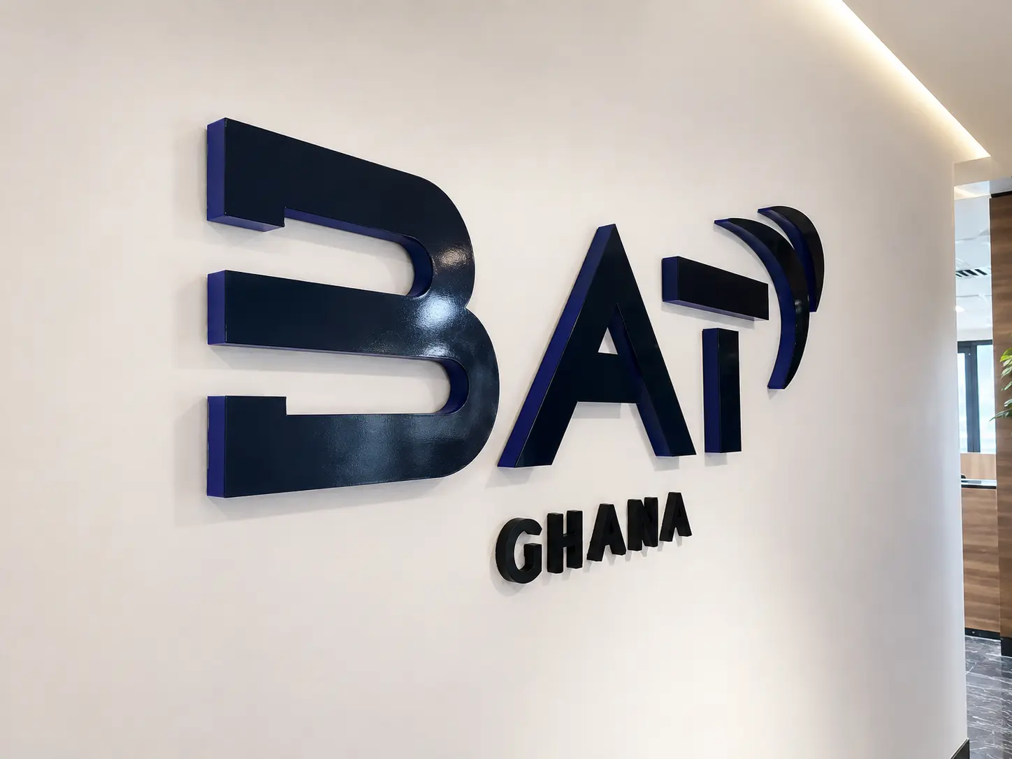 Dimensional BAT Ghana logo and lettering mounted on an exterior wall