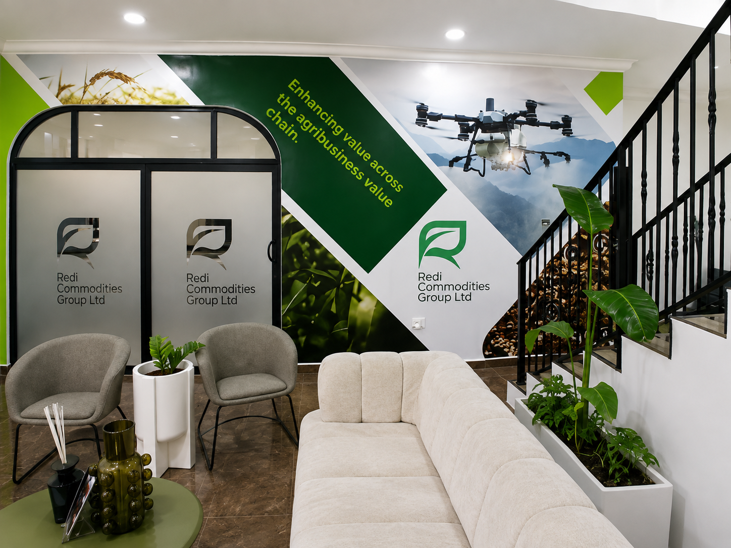 Branded corporate office interior with logo panels, graphics and consistent brand finishes